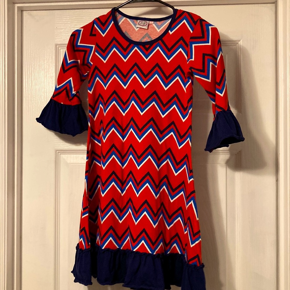 Little Lovebird dress with ruffles girls says size 10 fits more like a 7/8
